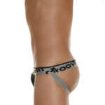 Side view of male model in GROOVIN’ JK0102 black Jock Strap – sleek, athletic design for men’s comfort and style